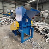 Machine de séparation automatique de tuyaux en PVC à un seul arbre avec broyeur de tuyaux en PVC à roulement pour le recyclage