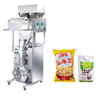 Machine d'emballage pneumatique multifonctionnelle à double tête pour aliments soufflés, frites, chips de pommes de terre, chips de bananes, granulés 3000g
