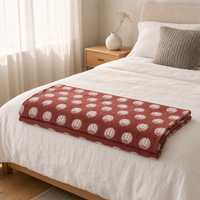 Plaid en jacquard double face 100% polyester avec ourlets triangulaires à points invisibles sur les 4 coins