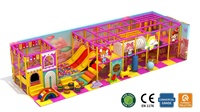 Équipement de terrain de jeu intérieur personnalisé, Thème Pays des bonbons, avec Toboggan jaune-rouge, Piscine à balles, Pont arc-en-ciel, Sacs de frappe et Porteurs à ressorts |   FEC