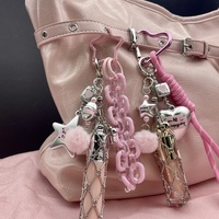 Porte-clés tendance et élégant en acier inoxydable avec pendentif cœur pentagramme et chaîne rose, sac en filet pour rouge à lèvres, vente en gros