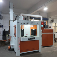 Machine de sablage à plateau tournant intermittent à 12 pistolets pour tasses et cabine de sablage antiadhésive