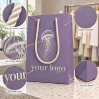 Sacs shopping en carton de luxe avec poignée en ruban imprimé sur mesure OEM, papier texturé, emballage cadeau en carton pour vêtements