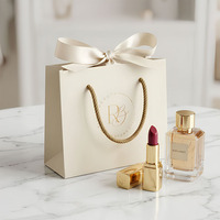 Sacs en papier personnalisés de luxe avec logo, estampage à chaud doré, emballages haut de gamme pour cosmétiques et soins de la peau, petits sacs cadeaux avec poignée en coton