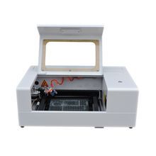 เครื่องแกะสลักและตัดด้วยเลเซอร์ CO2 แบบพกพา รุ่น 3020 มินิ พร้อมมอเตอร์กำลังไฟ 100 วัตต์ แรงดันไฟฟ้าคู่ 220V/110V - Product Image 4
