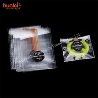 Sacs en cellophane transparents pour bonbons, sacs en plastique OPP avec attaches torsadées pour les cadeaux d'anniversaire, les bougies, les bonbons, les sucettes glacées