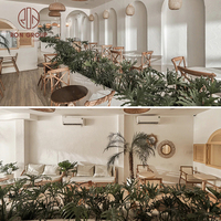 Ensemble de mobilier de restaurant au design naturel moderne : chaises en bois à dossier croisé, table ronde en marbre, banquette en tissu pour usage commercial