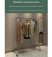 Support de présentation de vêtements simple en acier inoxydable sur pied, support de présentation pour magasin de vêtements
