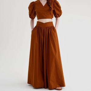 Ensemble de vêtements pour femmes 2025 OEM, très vendu, en lin, pour l'été, 2 pièces, haut de bikini et jupe longue à volants - Product Image 4