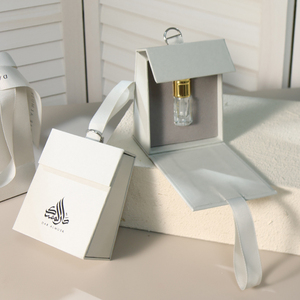 Custom Logo Luxury White Perfume Oil Packaging <b>Box</b> 8x5x10cm Magnetic Flip Top Gift <b>Box</b> with Ribbon Handle Bag Wholesale - Product Image 1
