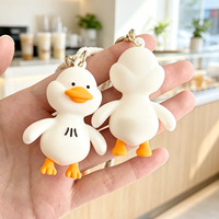 Llavero de silicona con diseño de pato blanco de dibujos animados, cuerda trenzada, colgante para mochila, regalo promocional, venta caliente de fábrica