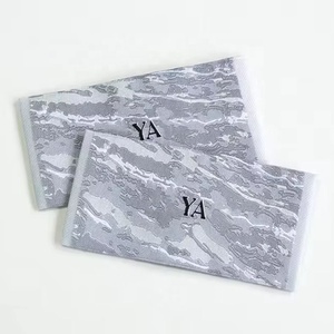 Etichetta Geweven ha incontrato Hoge dichheid Op Maat Gemaakt Merk Logo Uiteinde Gevouwen Borduurwerk Kleding tag Keper Rand Kledingaccessoi - Product Image 1