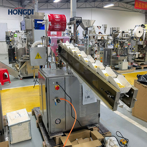 เครื่องบรรจุภัณฑ์แบบอัตโนมัติชนิดถังคว่ำขนาดเล็ก VFFS พร้อมสายพานลำเลียงถุงแบบถังสำหรับบรรจุอาหาร ผลิตภัณฑ์รูปทรงไม่ปกติ เสียงเบา - Product Image 6