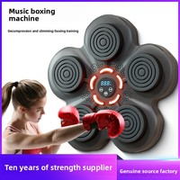 Équipement d'entraînement de boxe pour enfants en matériau ABS intelligent de Zhejiang avec cible murale musicale électronique pour la pratique à domicile