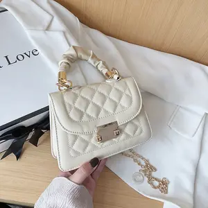 Lado del teléfono con lentejuelas reutilizable de bolsos usados Productos Venta al por mayor de China Bolso de mano de trabajo para mujeres Bolsos de Pu