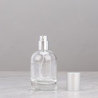 Flacon de parfum rond rechargeable 30ml 50ml 100ml, flacon vaporisateur de parfum portable de luxe avec bouchons argentés