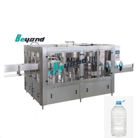 Remplisseuse de bouteilles PET entièrement automatique 2000BPH 5L-10L 3-en-1 pour ligne d'embouteillage d'eau minérale