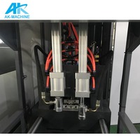 Machine de fabrication de bouteilles en plastique AK 31 Pakistan / Machine de soufflage de bouteilles de 20 litres / Moulage par injection de bouchons de bouteilles