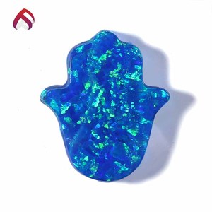 Venta caliente piedras preciosas creado ópalo sintético kyocera <span class=keywords><strong>azul</strong></span> océano hamsa opal mayorista con buen <span class=keywords><strong>precio</strong></span> - Product Image 1