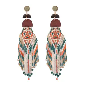 Bohemia color stitching handmade tassel earrings semi-round wood chip millet beads tassel catwalk wind earrings