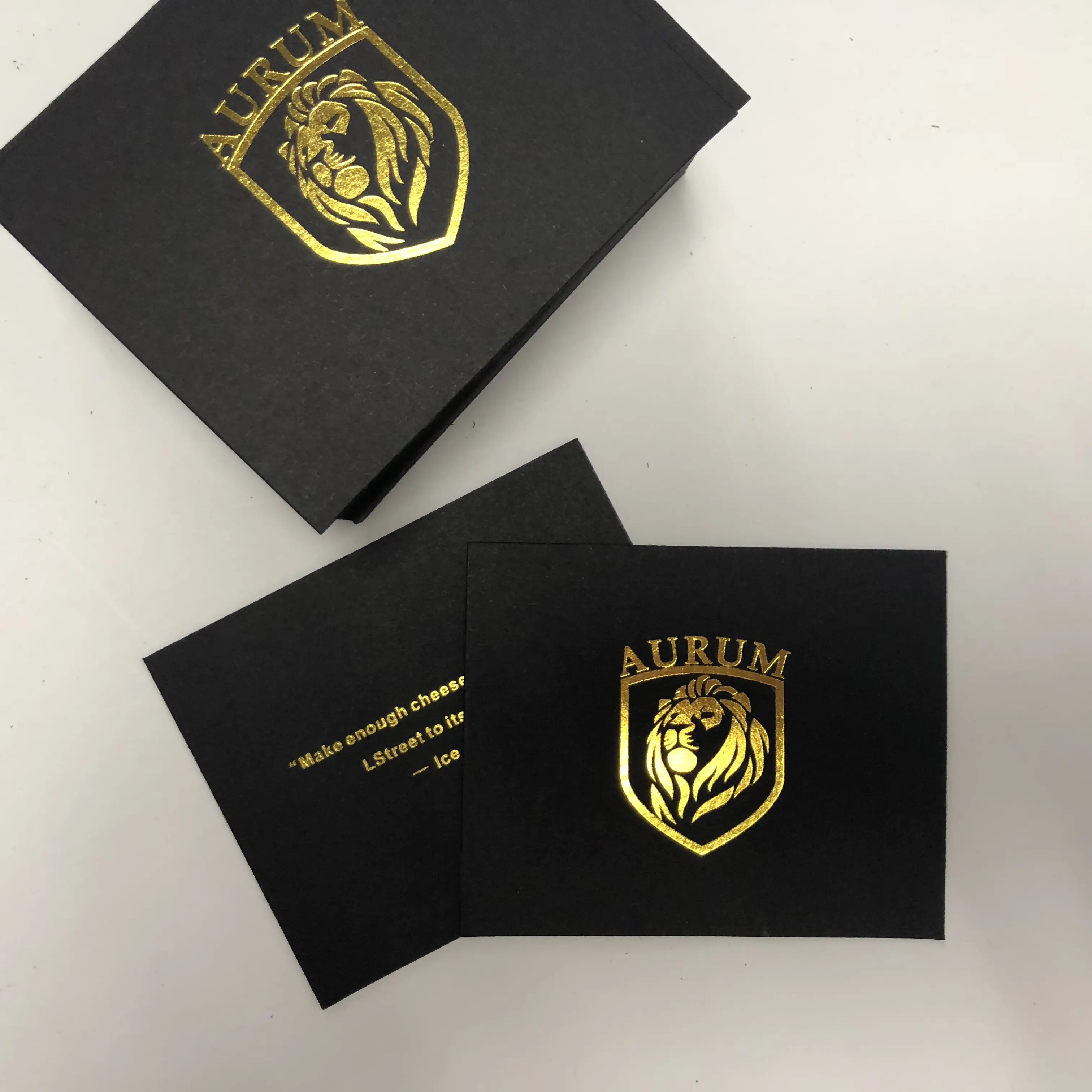 Black cardboard gold foil stamp embossed letterpress printing paper business card
