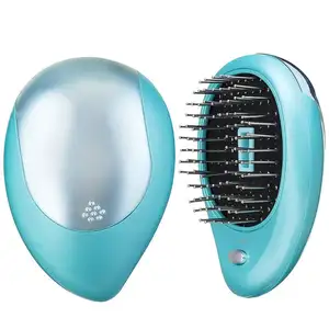 Cepillo de pelo iónico eléctrico portátil, Mini peine antiestático para masaje del cabello, cepillo mágico de belleza, herramienta de estilismo para el cabello para viajes en casa