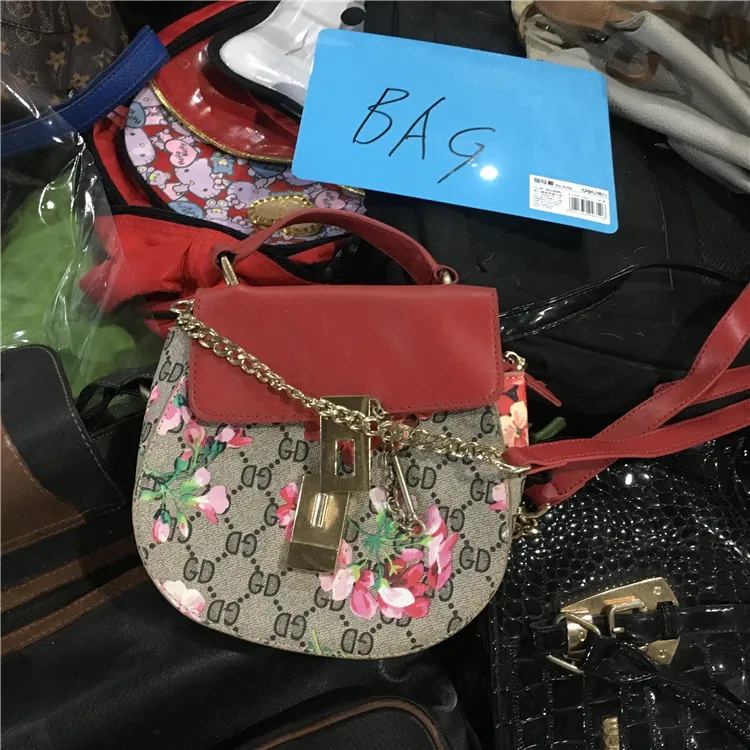 Venta al por mayor de ropa China, bolsos de mano de segunda mano para mujer y ropa usada en pacas