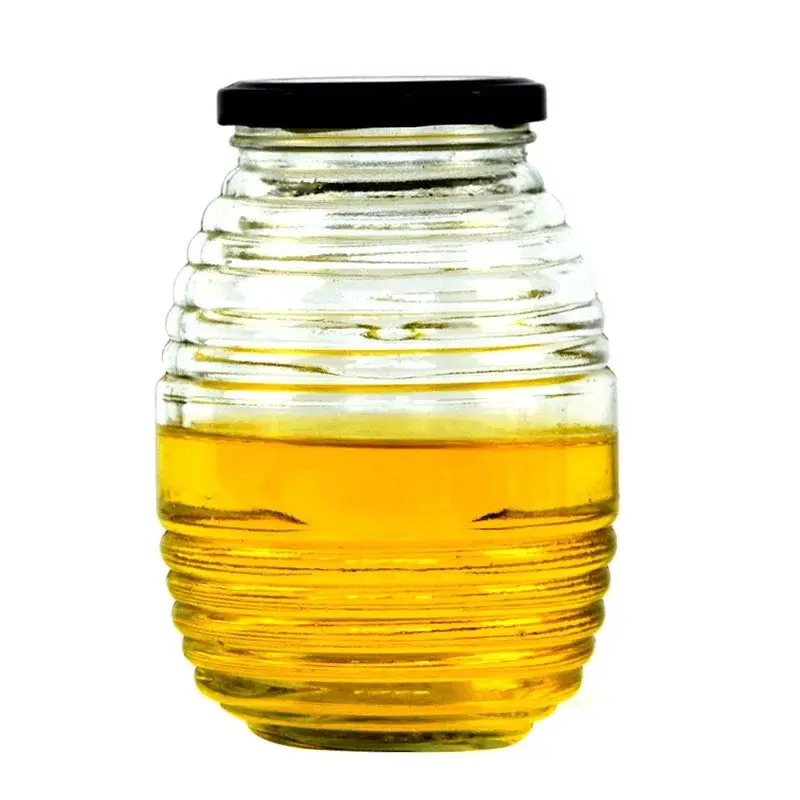 100ml 250ml 500ml 1000ml vuoto forma ape barattolo di archiviazione contenitore di alimento di vetro miele bottiglie e vaso con coperchio in metallo commercio all'ingrosso