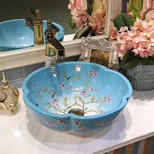 Warehouse flower shape butterfly and bird design porcelain ceramic wash basin countertop bathroom sink blue