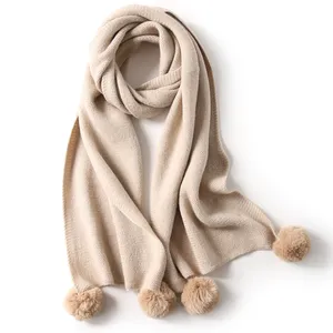 Wholesale hot selling fall winter girls stylish solid color knitted scarves warm cashmere muffler Knitted scarf with fur pompoms