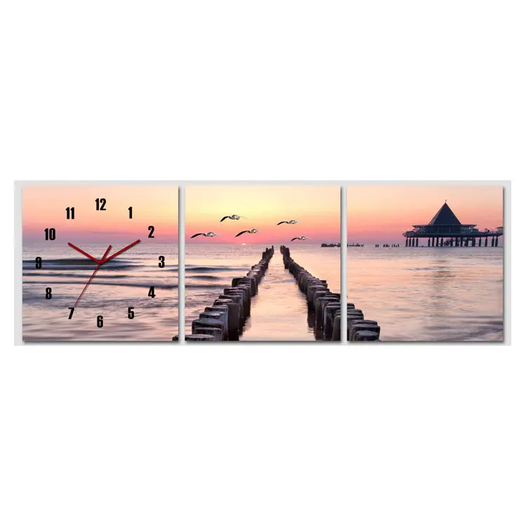 big clock wall with red sunset landscape