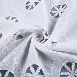 Nueva moda diseño de prendas de vestir blanco corte láser agujero gasa bordado tela de algodón
