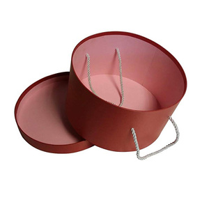 กล่องหมวกกระดาษแข็งทรงกลมแบบกำหนดเองพร้อมหูหิ้ว - Product Image 1