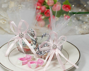 Alta calidad nuevo creativo elegante mini plástico forma de cisne caja de dulces suministros de boda