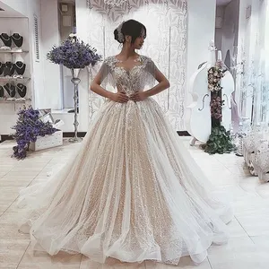 Sparkly Ball Gown Wedding Dresses 2023 Tassel Short Sleeves Bridal Gown Keyhole Lace Up Back Wedding Gowns Fashion Bridal Dress