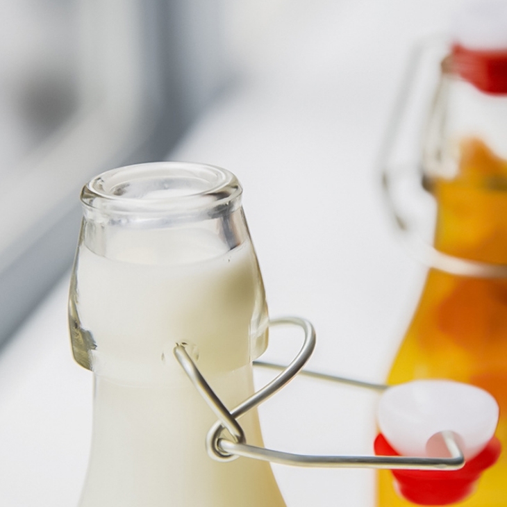 250 ml 500 ml 750 ml botella de leche de cristal Flip Top tapa de la botella de agua