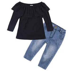 Ivy10247A Europese meisjes lente boutique suits meisjes lange mouw zwarte top met verontruste jeans kleding sets