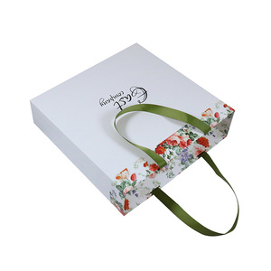 Nuevo diseño elegante de gran tamaño de cinta mango blanco bolsa de papel de embalaje para tienda de ropa - Product Image 2