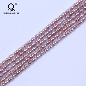 Daking AA al por mayor 2,5-3mm Natural arroz púrpura verdadera perla Strand precio para la joyería - Product Image 1