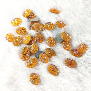 Pegamento de cuentas de resina ovalada amarilla de 10x14mm en el <span class=keywords><strong>vestido</strong></span> de novia y pegamento de diamantes de imitación con reverso plano en el pendiente del perno prisionero como decoración Venta caliente - Product Image 1