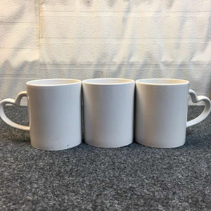 Rubysub M002 <span class=keywords><strong>di</strong></span> alta qualità 11oz <span class=keywords><strong>cuore</strong></span> maniglia ceramica sublimazione spazi vuoti tazze da <span class=keywords><strong>caffè</strong></span> fornitore all'ingrosso - Product Image 2