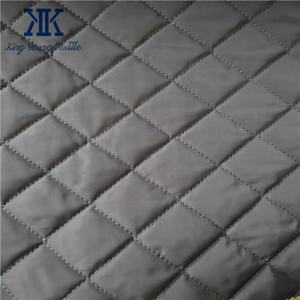 Tissus de manteau matelassé imperméable doux et durables de haute qualité/tissu matelassé à mémoire de polyester diamant d'hiver pour manteau - Product Image 1