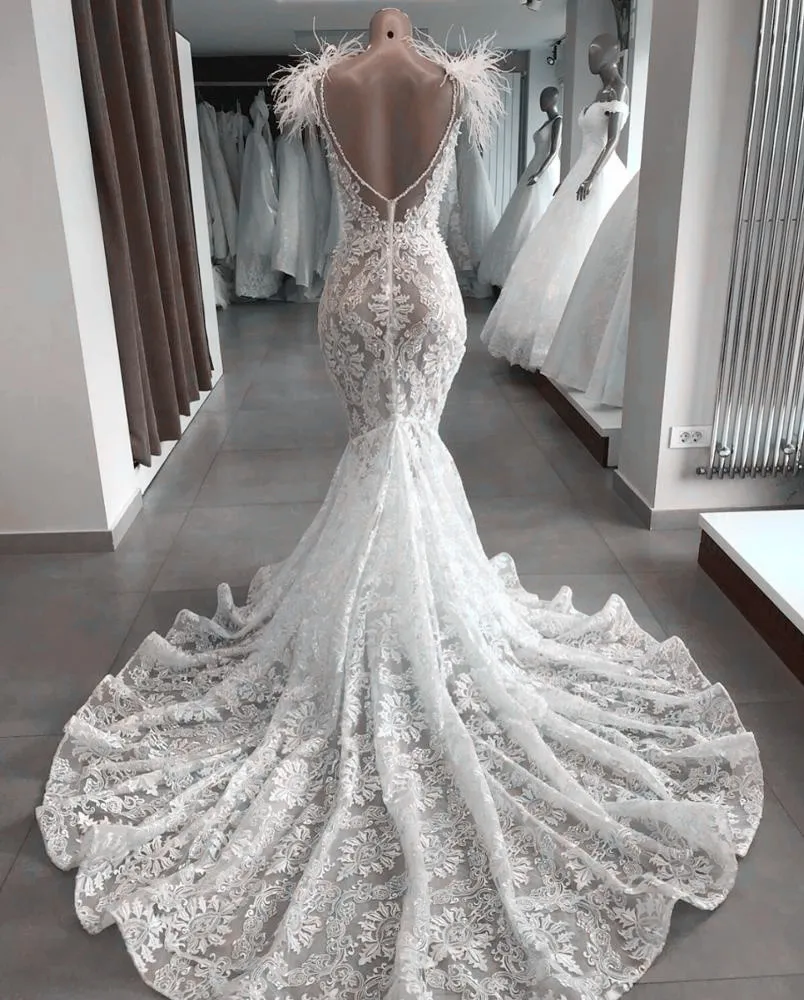 Trova le migliori abito da sposa con piume di struzzo Produttori e abito da  sposa con piume di struzzo per italian Speaker Mercato in alibaba.com