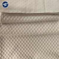 Les tissus tricotés sont composés de tissus jacquard 100% polyester pour matelas
