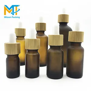 luxury 5ml 10ml 15ml 20ml 30ml 50ml 100ml amber frosted glass dropper bottle with bamboo lid