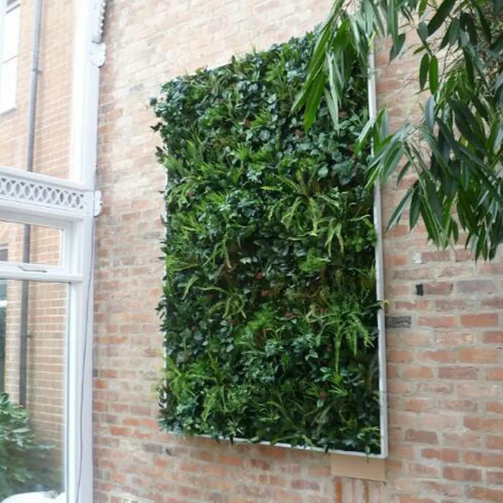 गर्म बिक्री में रहने वाले प्लान्टर ऊर्ध्वाधर उद्यान कृत्रिम हरे पौधों दीवारों बाहरी उपयोग के लिए