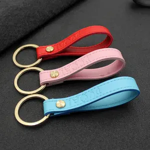 Debossed Logo Khuyến Mại Treo PU Hoặc PVC Da Đóng Dấu Chuỗi Keychain