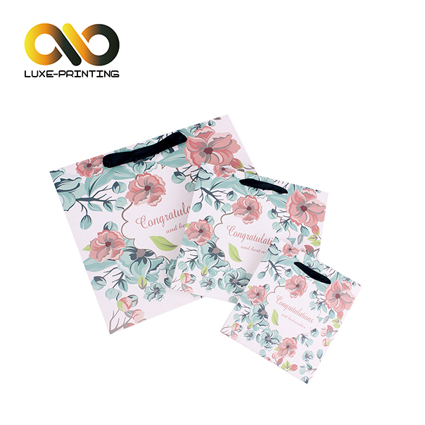 Пользовательские логотипы, печатающие пучки волос, упаковывающие бумажный пакет с ручкой с лентой