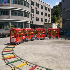 Fabricación directa de Parque de Atracciones paseos en autobús eléctrico mini pista tren para la venta - Product Image 1