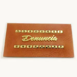 Customized Embossed fake leather label with metal for jeans